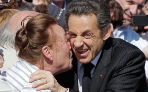 French President and candidate for re-election Nicolas Sarkozy is greeted by a local resident as he visits the medieval town of Guerande, western France 1. French President and candidate for re-election Nicolas Sarkozy is greeted by a local resident as he visits the medieval town of Guerande, western France