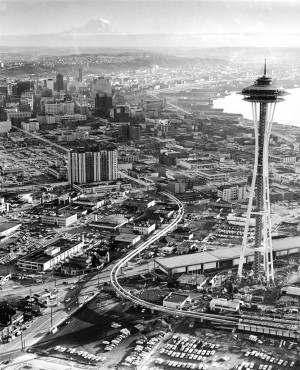 This overview of Seattle and the newly constructed Space Needle was taken in April 1962. The Space Needle was built for the 1962 World's Fair and is the most popular tourist attraction in Seattle. 1. This overview of Seattle and the newly constructed Space Needle was taken in April 1962. The Space Needle was built for the 1962 World's Fair and is the most popular tourist attraction in Seattle.