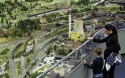 Aron, 5, and his mother look out at the LOXX miniature train landscape at the Alexa shopping centre in Berlin. The huge model train set recreates, in 1:87 scale, Berlin landmarks as well as humorous scenes of everyday life. 1. Aron, 5, and his mother look out at the LOXX miniature train landscape at the Alexa shopping centre in Berlin. The huge model train set recreates, in 1:87 scale, Berlin landmarks as well as humorous scenes of everyday life.